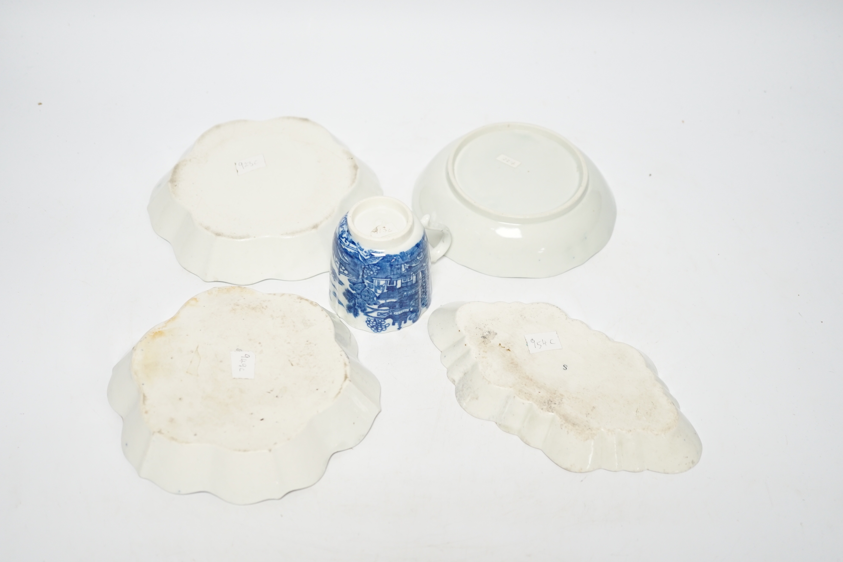 A group of Caughley pagoda pattern table wares, late 18th century, including two teapot stands, a coffee cup and saucer and a spoon tray